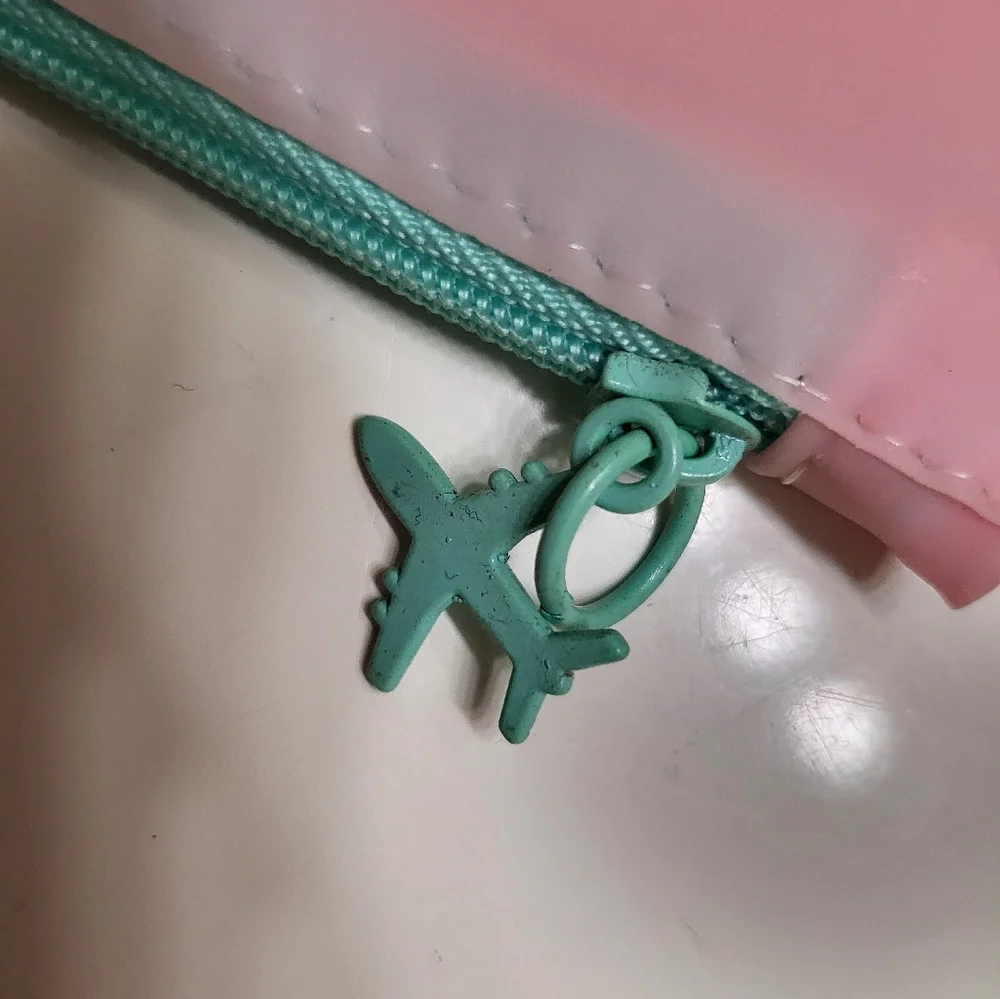 IPSY Pink Escape Cosmetic Bag With Airplane Zipper Pull